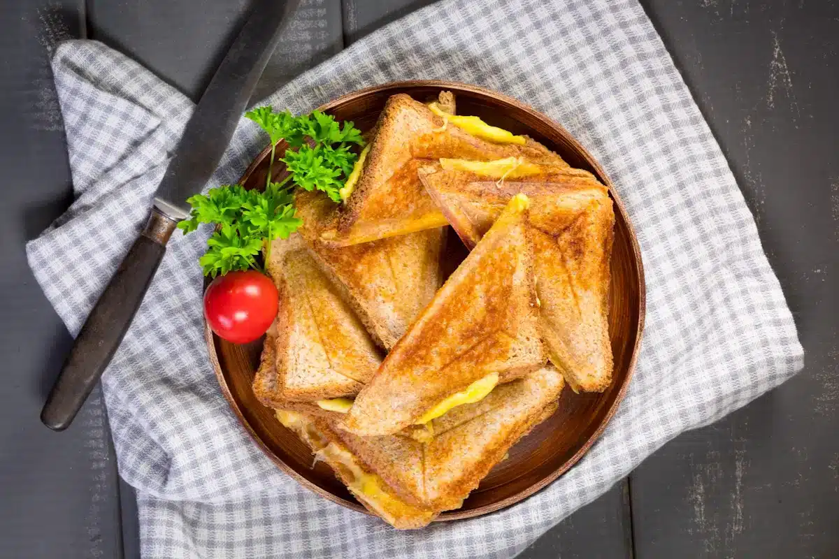 A plate filled with three Healthy Grilled Cheese Sandwiches