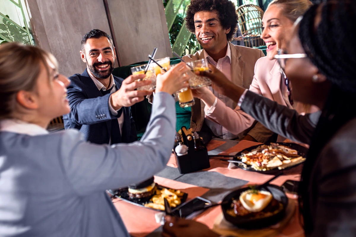 A group of business people having linch at a restaurant
