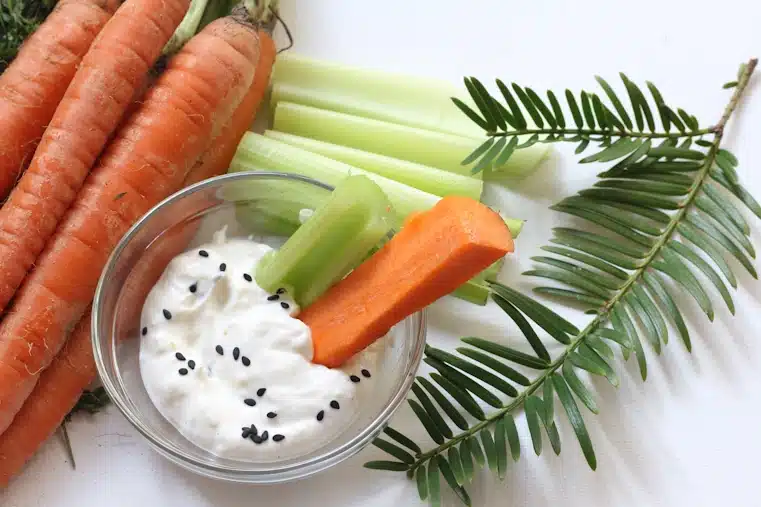 Carrot and cucumber sticks with creamy Greek yogurt dip