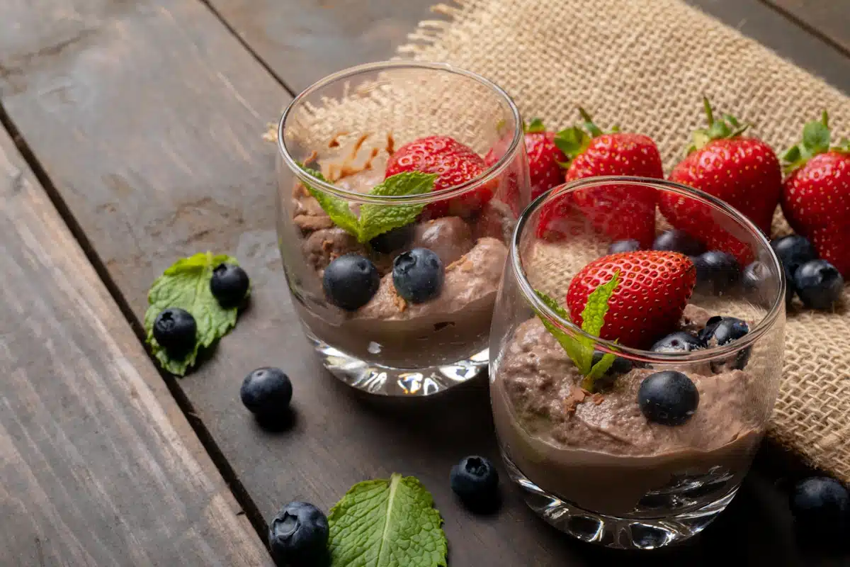 Chocolate mousse with strawberries and blueberries