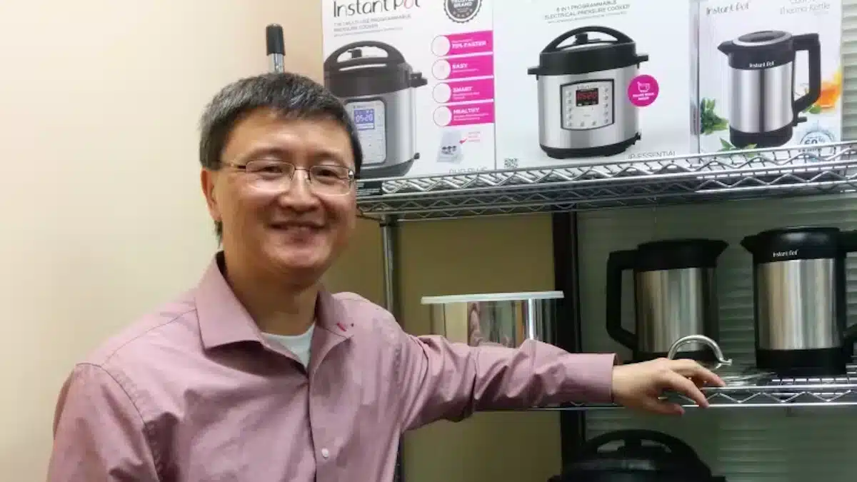 Inventor and former Nortel engineer Robert Wang poses with some Instant Brands products but now Instant Pot is saved thanks to new ownership