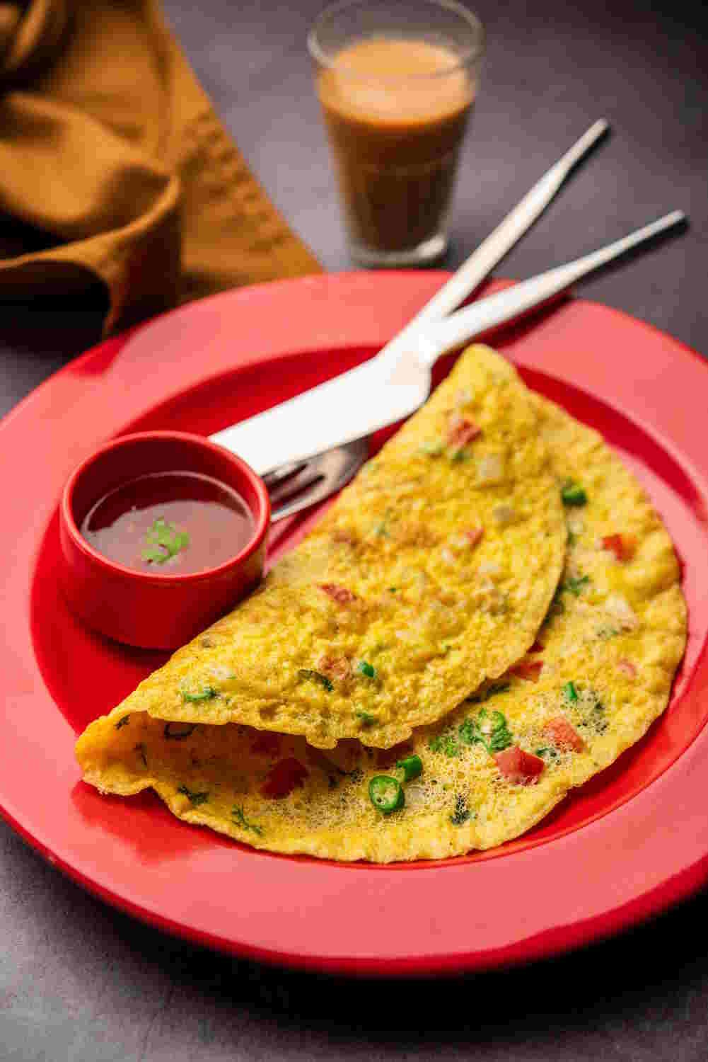 Indian Spiced Masala Omelet filled with fresh vegetables