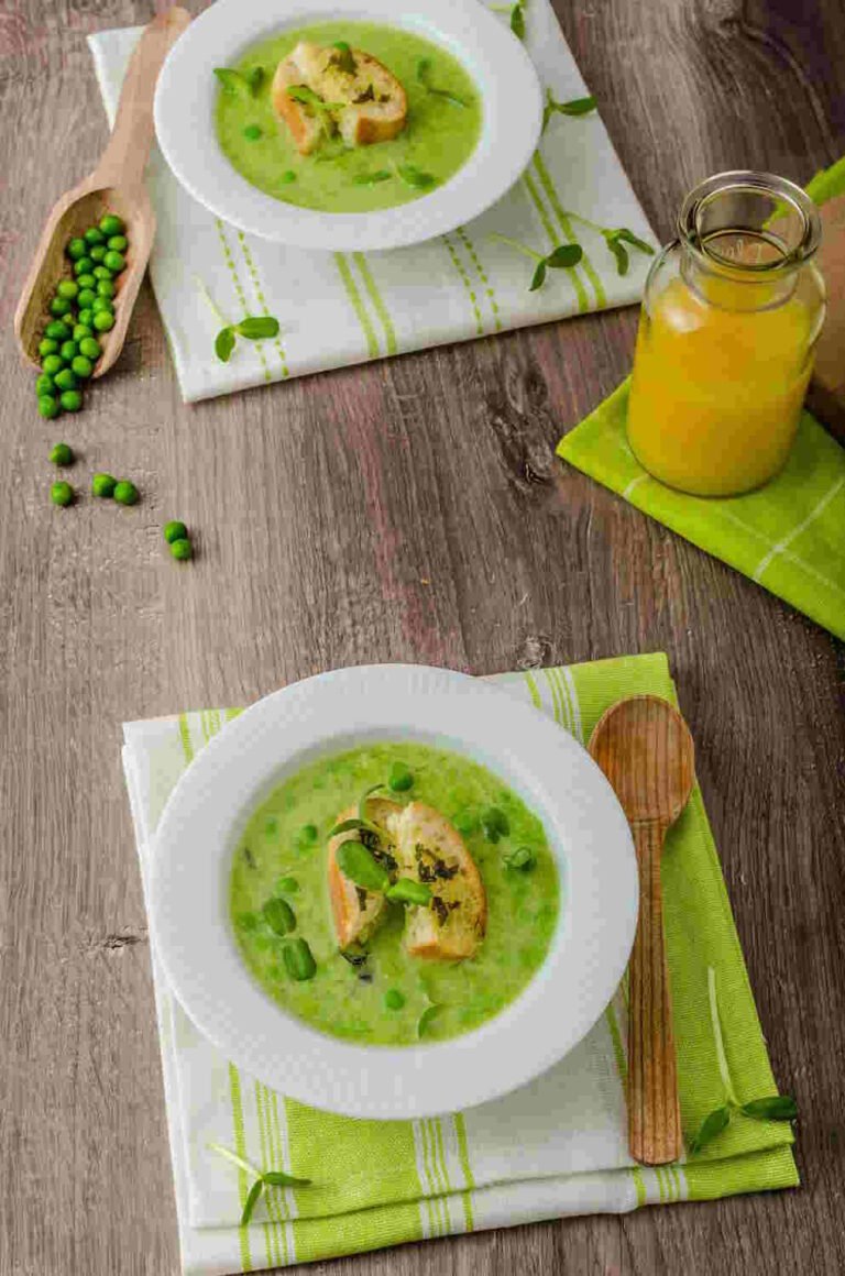 Spring Soup Recipes Fresh pea soup with bread slices