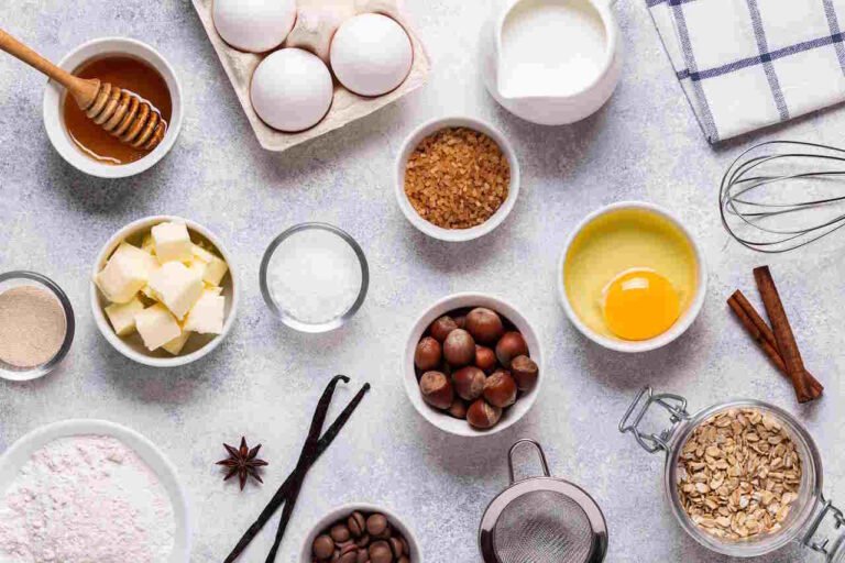 Sugar-Free dessert ingredients - flour, milk, salt, sugar substitute, eggs. Top view, copy space.