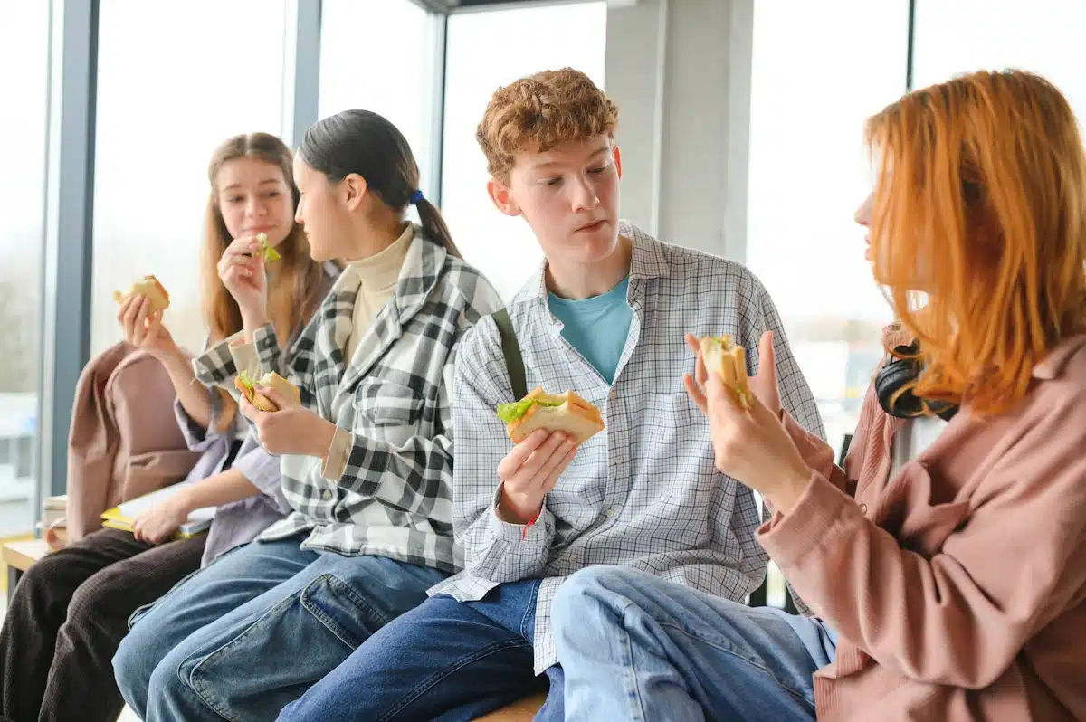 Teens and Tweens eating their lunches at school