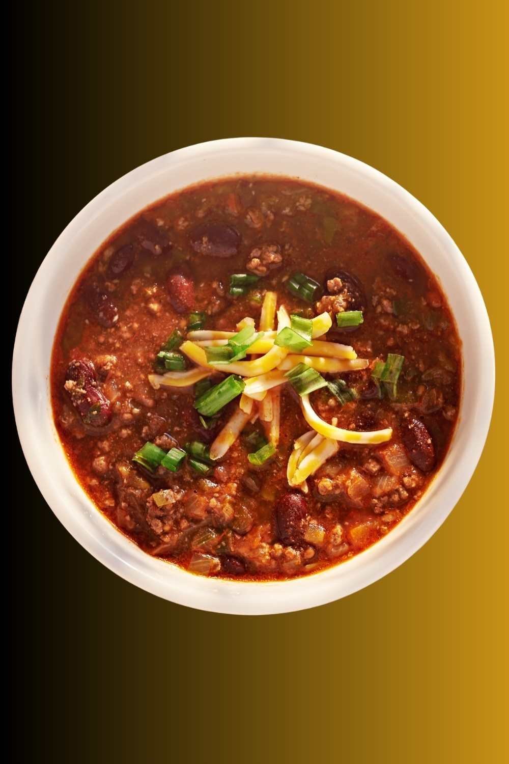 Bowl of turkey chili with toppings