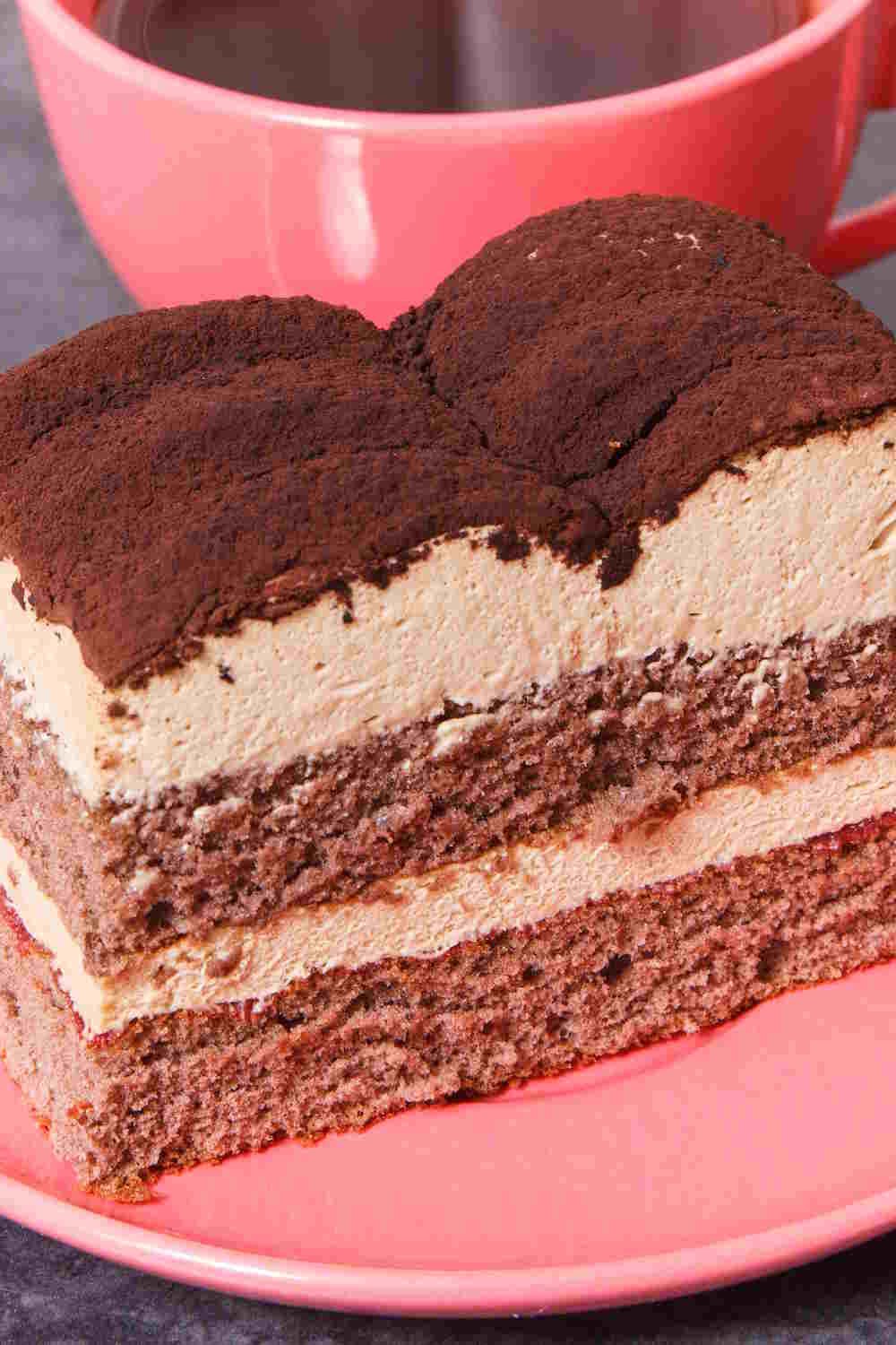 Slice of Tiramisu recipe dessert with a cup of coffee