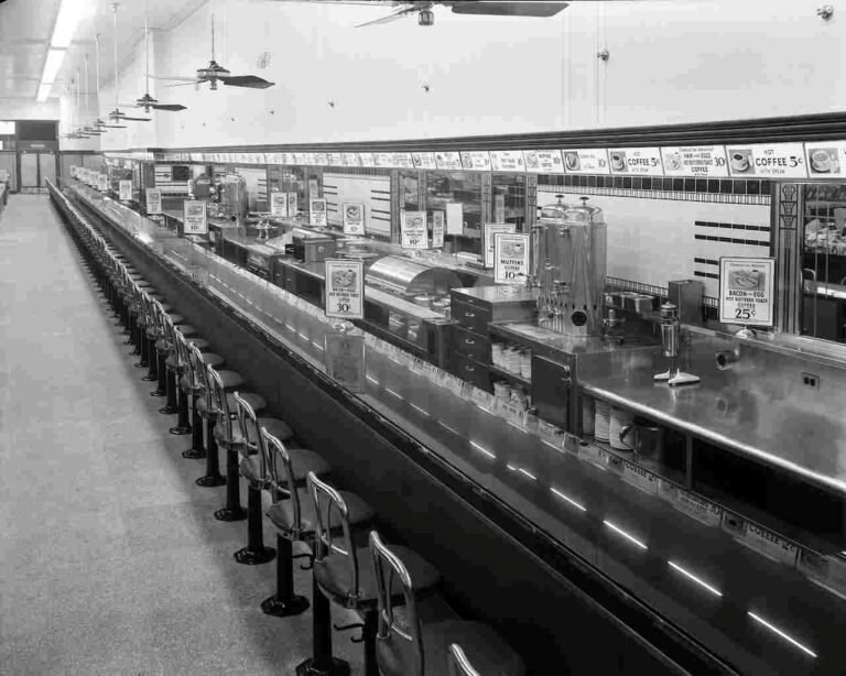 Empty Woolworth's lunch counter with stools