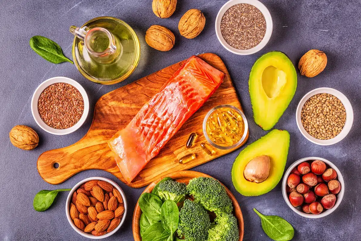 animal-and-vegetable-sources-of-omega-3-acids including avocados, salmon. nuts,spinach and broccoli