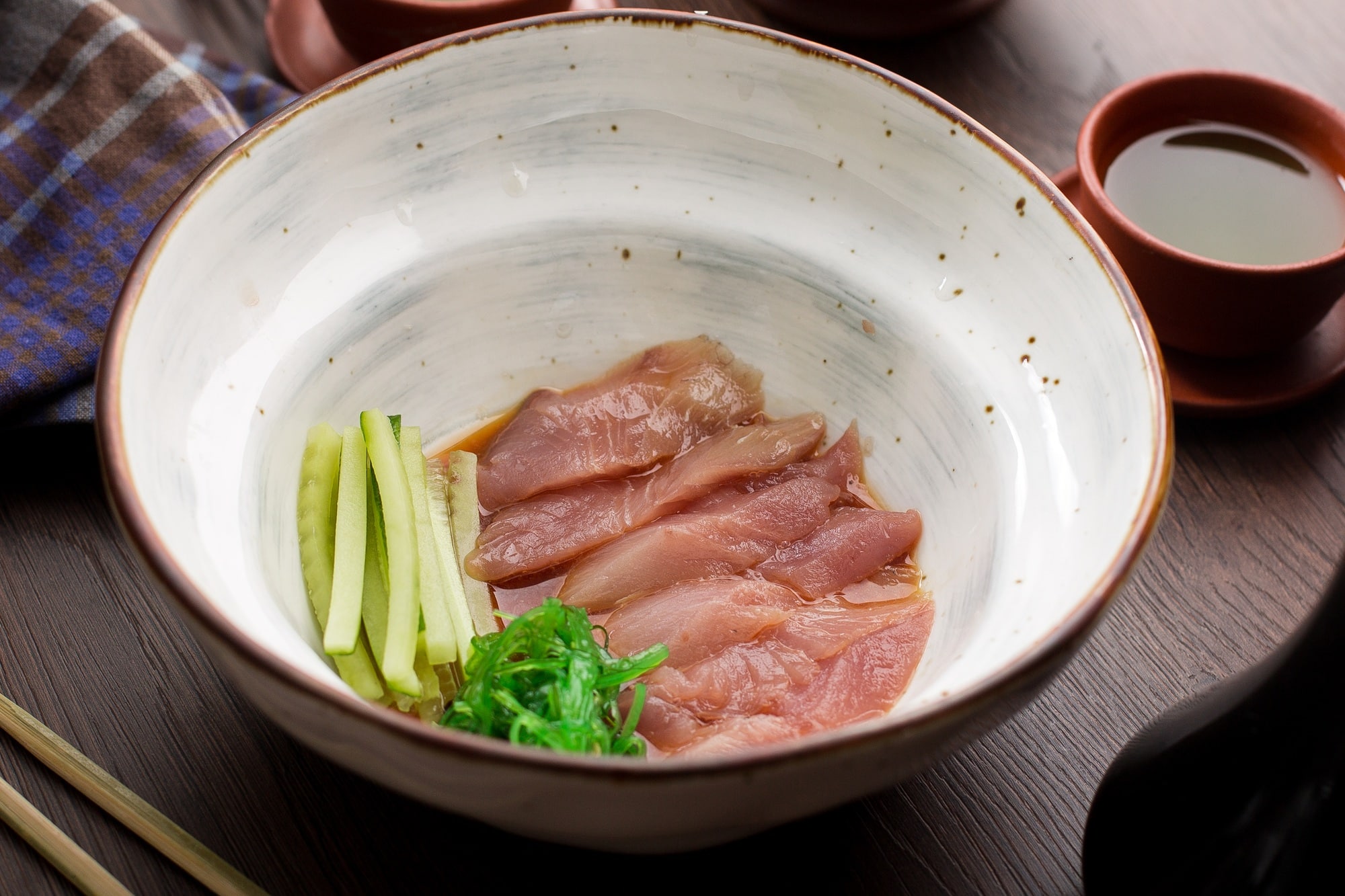 Asian food: fish sashimi with cucumber