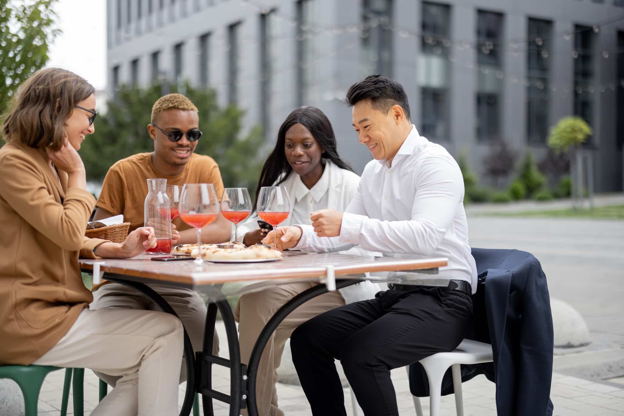 Business team having lunch at outdoor cafe