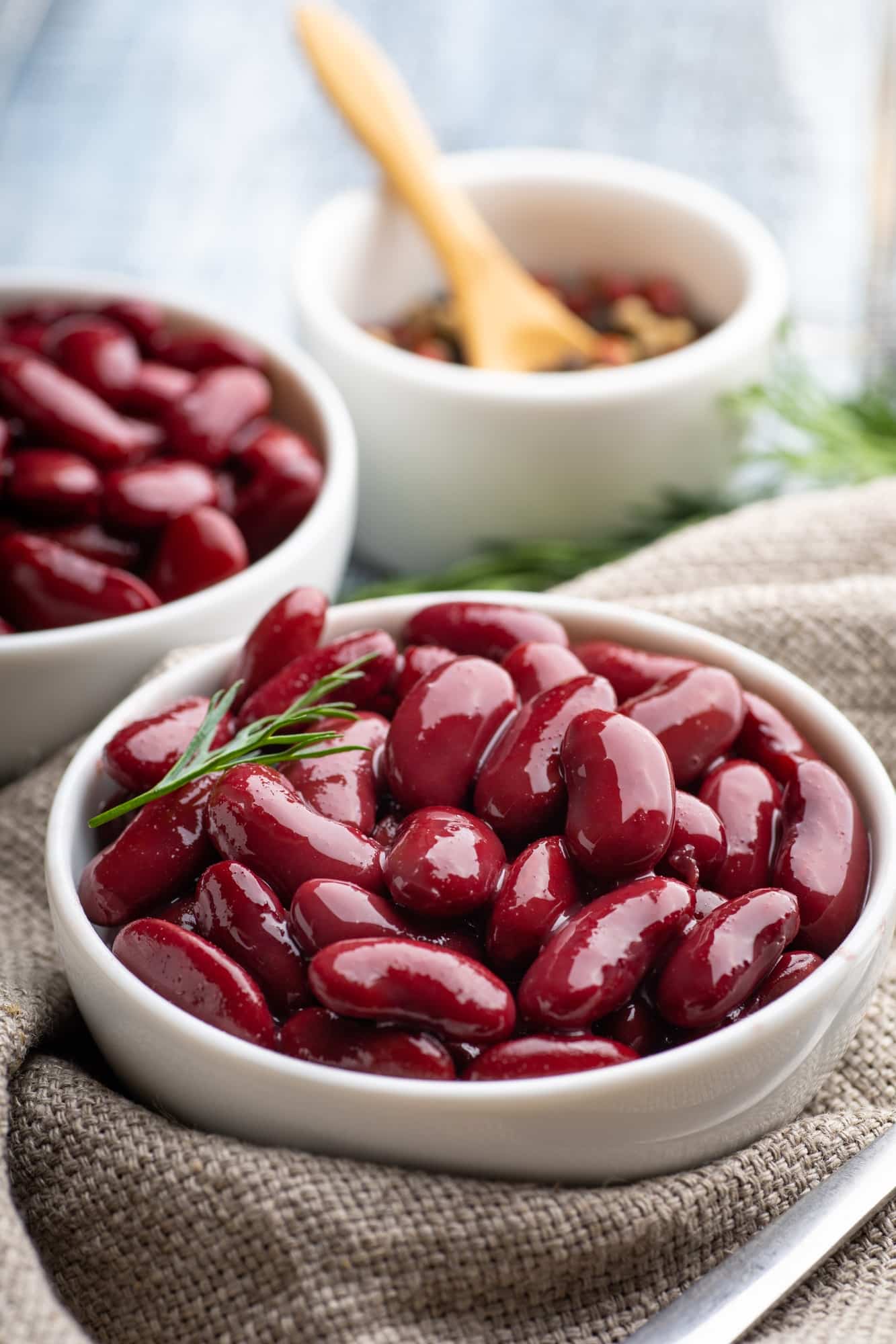 Canned red kidney beans in white bowl