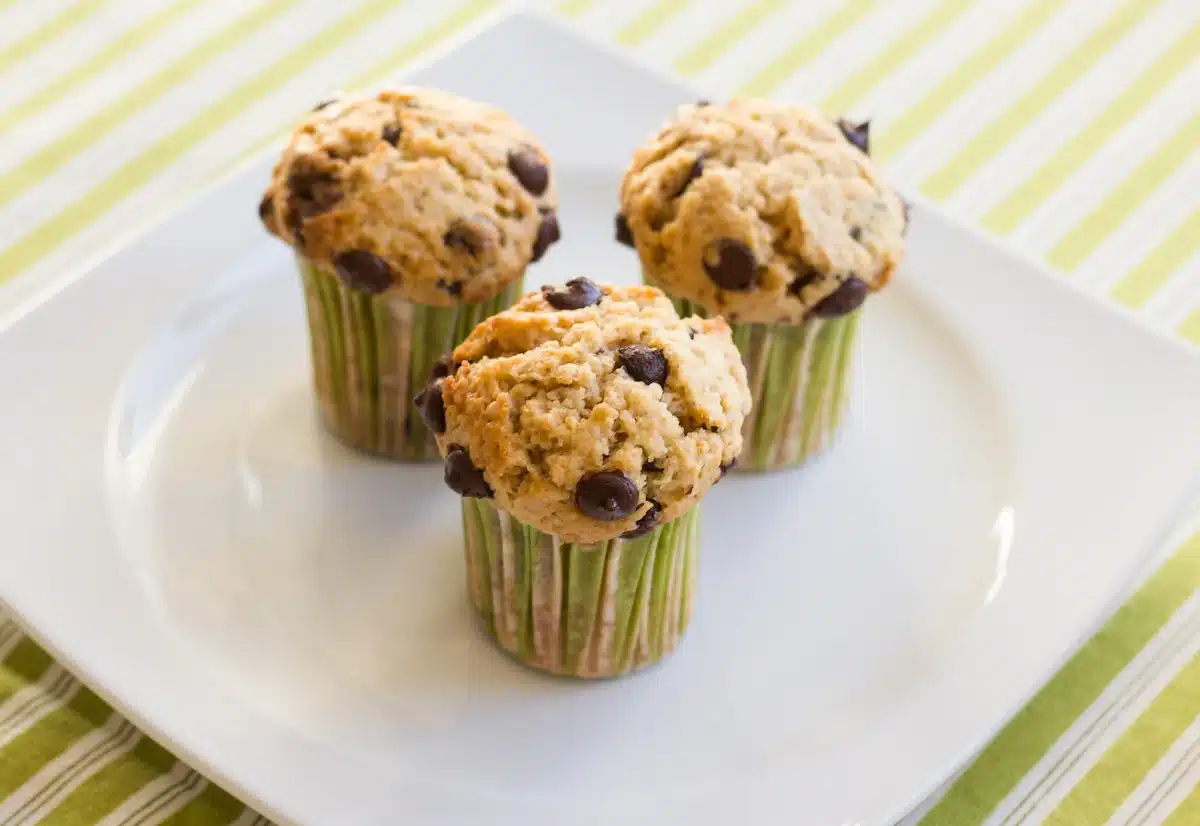 chocolate chip wheat germ muffins on a white plate