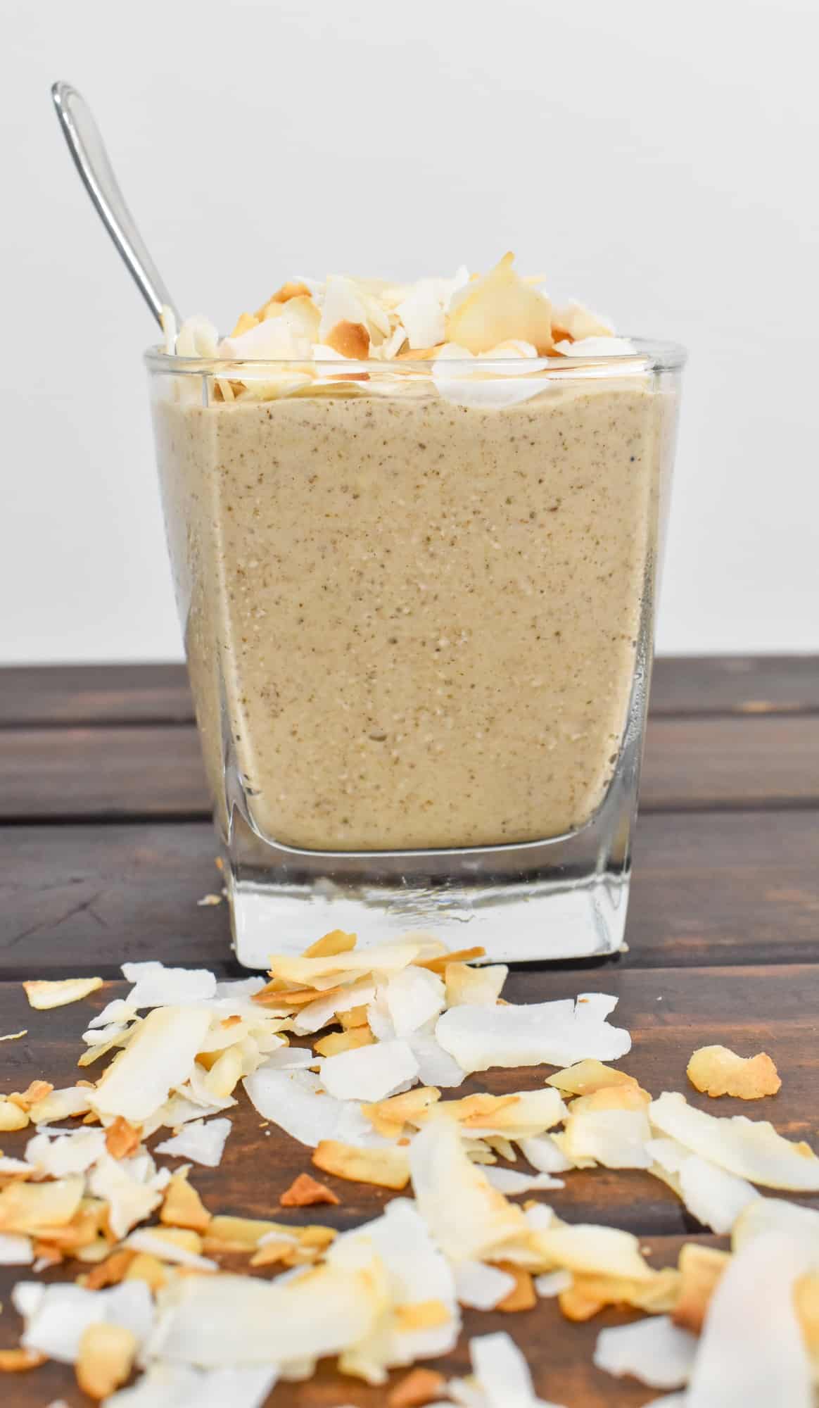 Coconut, Chia and Cinnamon Cream Pie made in a blender, with toasted coconut flakes on the top.