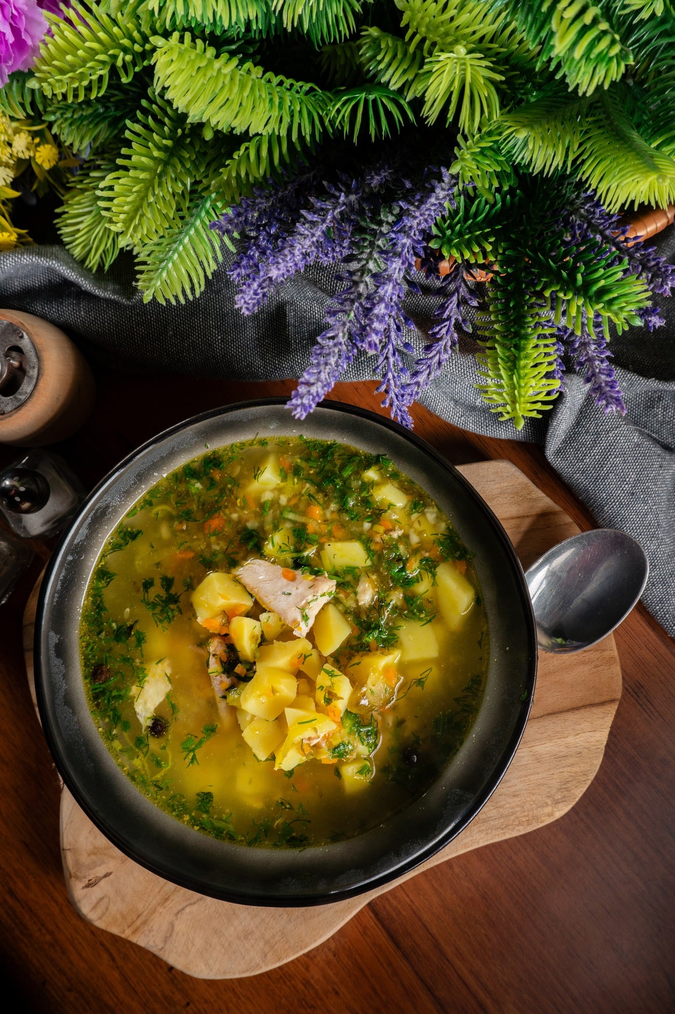 Cucumber soup in dark bowl.