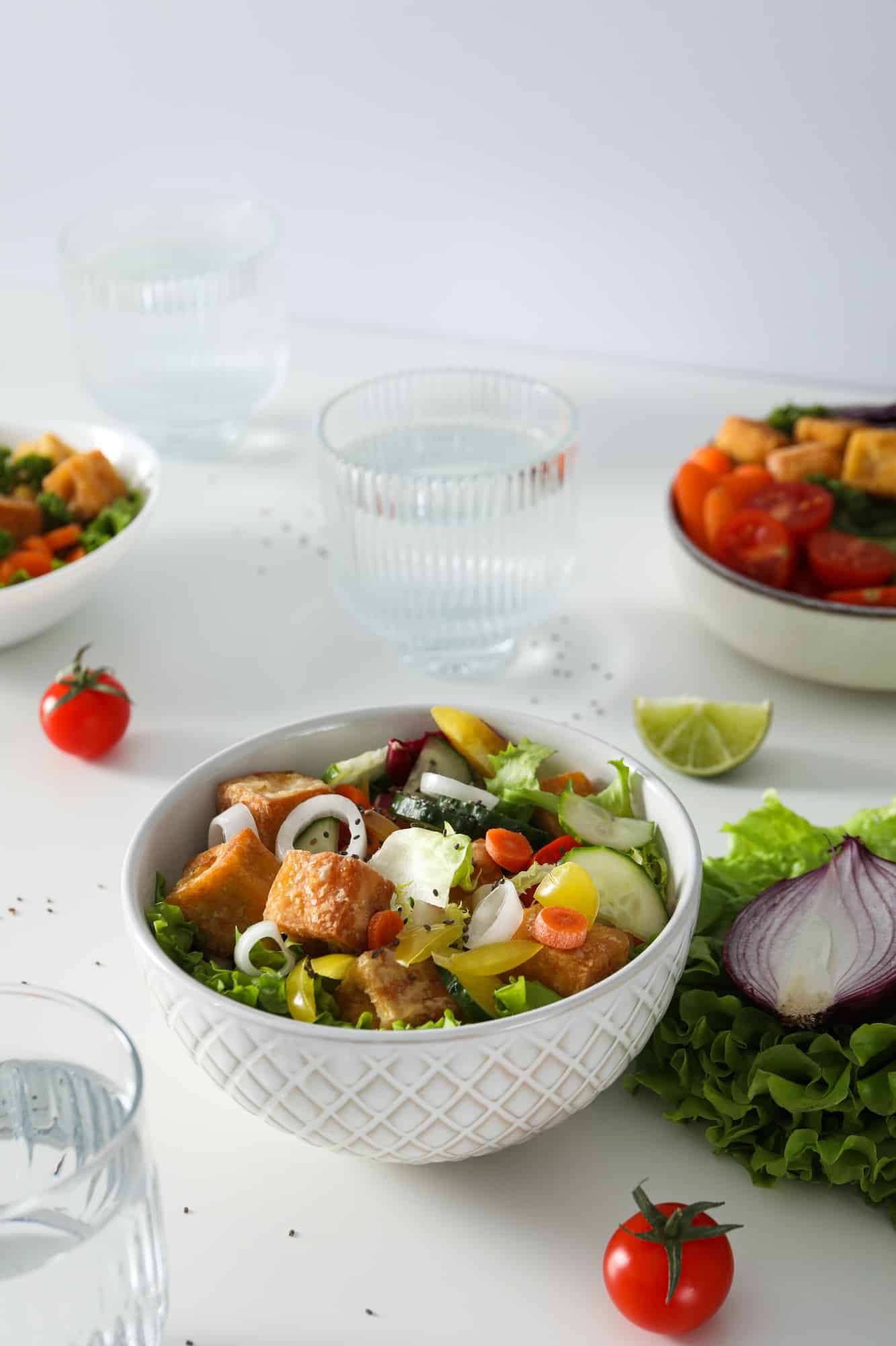 Fried tofu salad in a bowl with vegetables