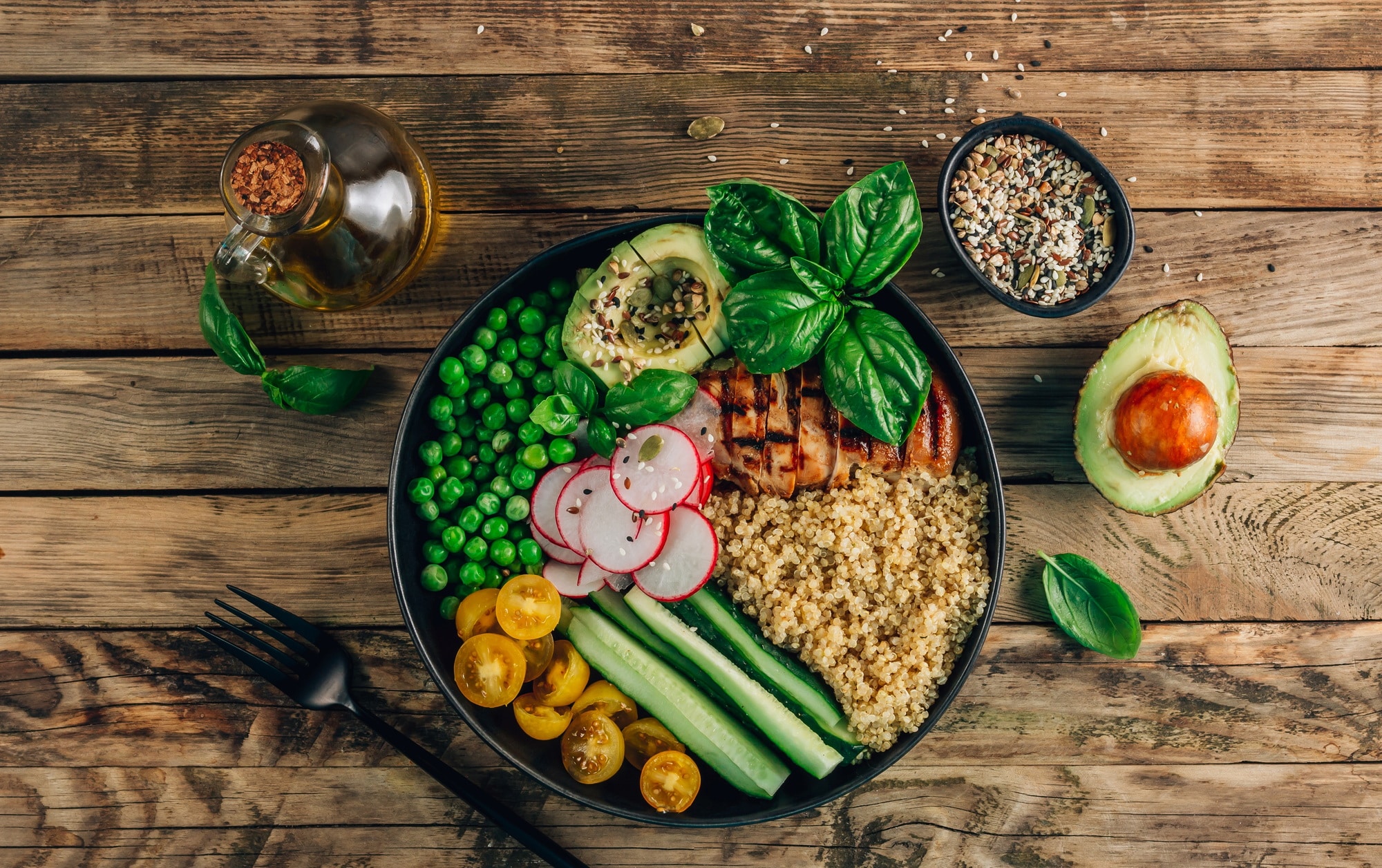 Healthy salad bowl with quinoa and chicken