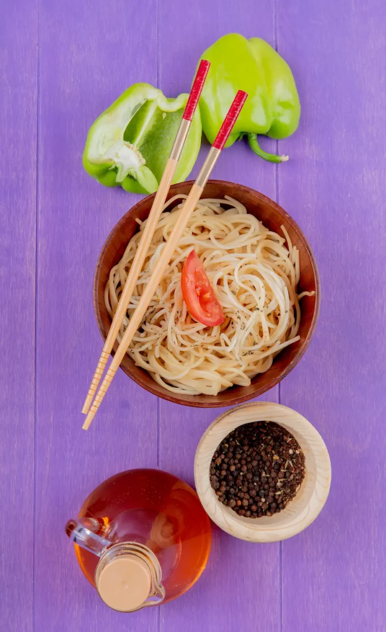 Bowl of konjac noodles with vegetables and condiments