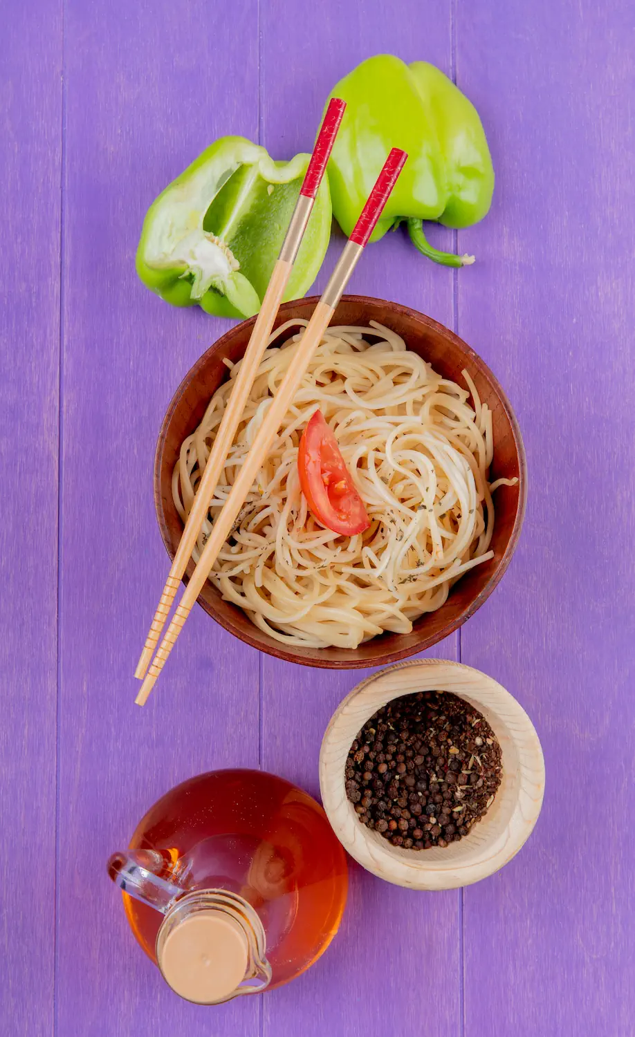 Bowl of konjac noodles with vegetables and condiments