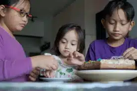 Photo of Toddlers and tweens eating together