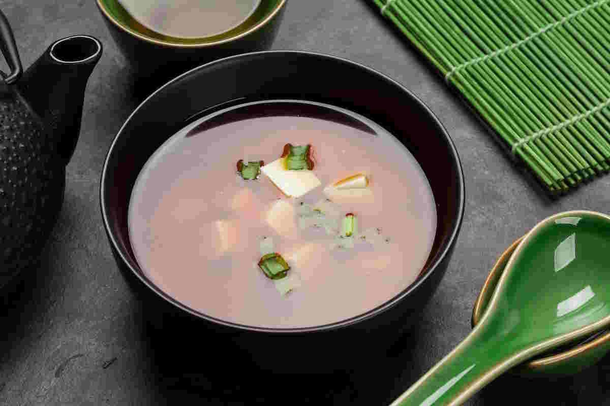 Bowl of miso soup with tofu and spinach