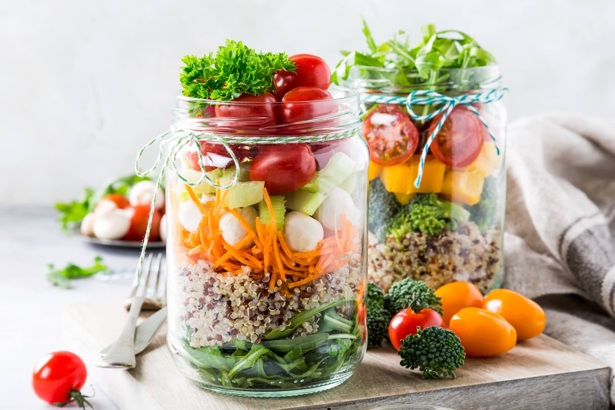 Salad in glass jar with quinoa