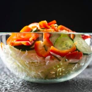 salad with cabbage in glass bowl