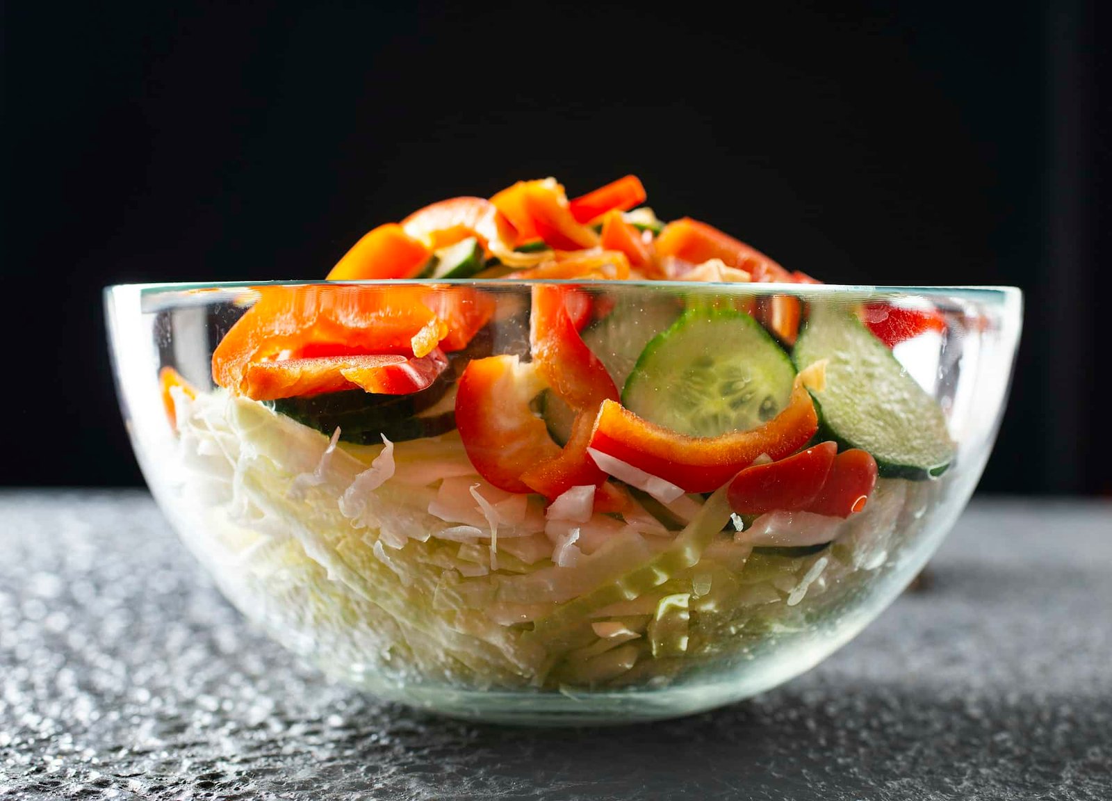 salad with cabbage in glass bowl