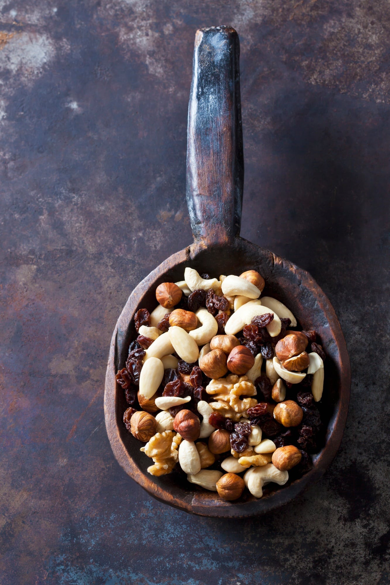 Wooden spoon of trail mix